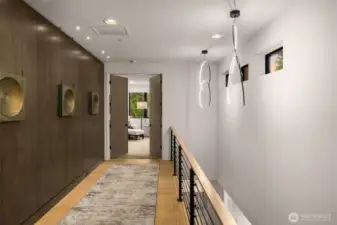 Continued white oak paneling and designer lighting.