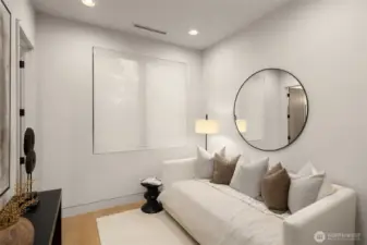 Main level guest suite with three quarter bath.