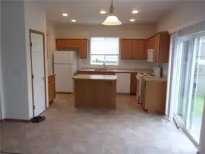 Kitchen has breakfast bar, pantry, range/oven, refrigerator, dishwasher, and microwave.