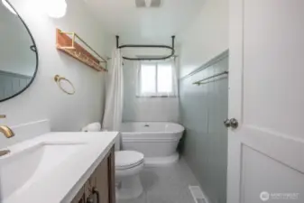 Completely updated  main bath with soaking tub/shower.