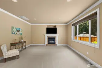 TV / Entertainment room  by Kitchen feel like open concept, 2nd gas firelplace