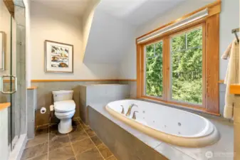 Soaking tub with view—your daily dose of mountain serenity.