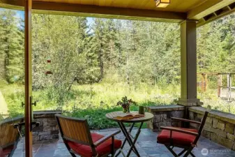 Landscaped English-style garden adds color and seasonal joy. Heated back deck extends your outdoor living season.
