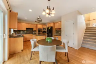 kitchen dinning space with slider to rear deck.