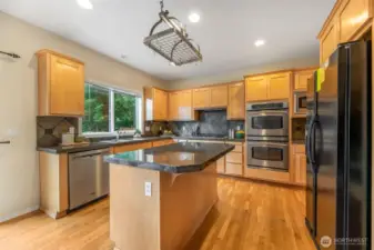 Large kitchen with plenty of storage.