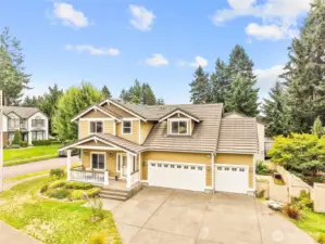 Welcome to 9209 Vancouver Dr NE in Meridian Campus. This large corner lot has beautiful stone steps down to a huge patio is mature landscaping.