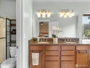 Primary Bathroom is split into two spaces, allowing multiple users.