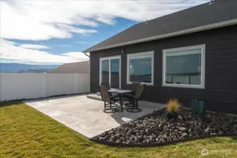 Quaint patio perfect for entertaining, relaxing, and enjoying the outdoor views.