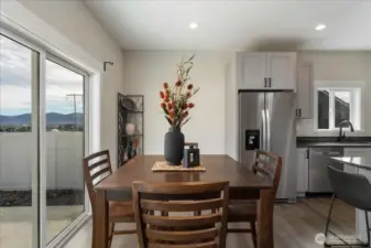 Eating space with sliding door access to backyard.