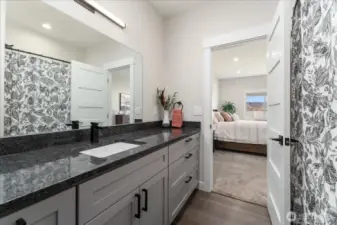 Stylish primary bath offering ample space and comfort.