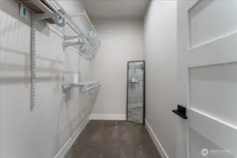 Primary walk-in closet.