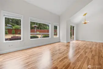 Open concept plan for main living area. Includes living room, diing area, kitchen, 3rd bedroom and/or office