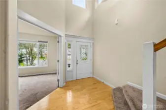 Hardwood floors from the entry to the kitchen.