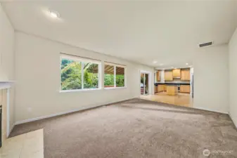 Open concept family room and kitchen area.