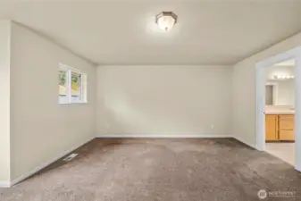 Large primary bedroom with private 5-piece ensuite.