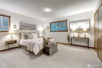 Main floor Primary Bdrm w/ ensuite bath