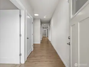 As you enter, beautiful LVP leads you into the 1st bedroom immediately on the left.