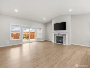 Large windows allow an abundance of natural light to filter through the home.