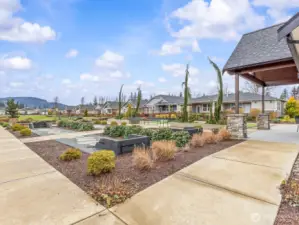 A walking trail surrounds the acre sized park full of outdoor activities.