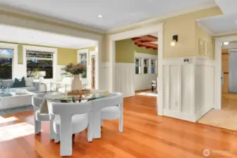 Open area on main level currently staged as informal dining space