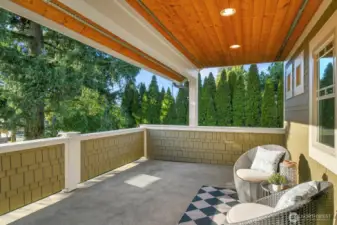 This covered deck is accessed from the primary bedroom