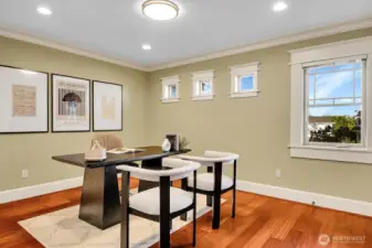 SE bedroom in upper level is staged as a home office