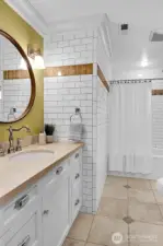 The second of two full bathrooms in the hallway of the upper level