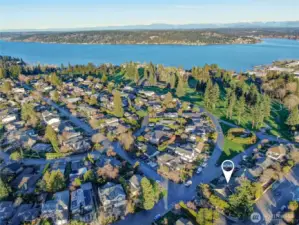 This aerial photo shows the proximity of the home to the golf course in the Sand Point Country Club