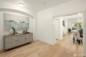 Inviting entry with engineered hardwood floors and open sightlines to main living areas.