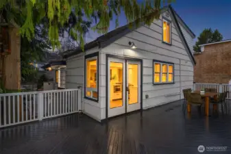 Rear deck conveniently right off the kitchen making it easy to dine outside.