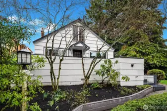 Garden pathway to the front deck and entrance presents many options for your plantings.