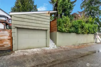 Detached garage off the alley. Upper level in garage is for storage and has its own door.