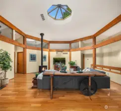 High ceilings and an incredible skylight will wow you upon entry