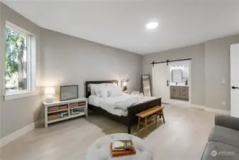 Spacious primary bedroom on main