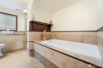 Soaking tub in second primary suite.