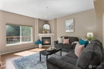 Natural Light & Fresh Paint to brighten your main living space with gas fireplace.