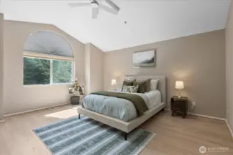 Spacious, Light & Bright Primary! Picture window overlooks the park setting.