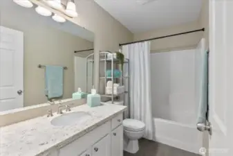 Full Bath located right next to the Bedrooms. Beautiful finish work, including fresh paint.