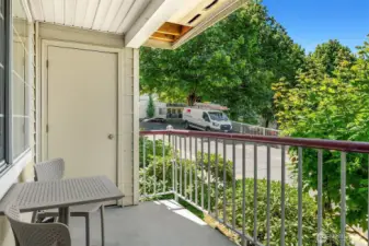 Enjoy this cozy deck with western light exposure and storage.