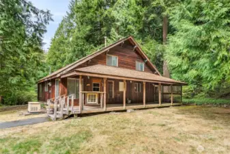 Tucked away in Woodinville, close to everything yet hidden in the trees, this cedar lodge offers 1,890sq ft of rustic warmth w/vaulted ceilings, wood beams, and storybook charm.