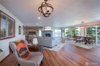 New Brazilian Cherry hardwood floors with wood burning fireplace.