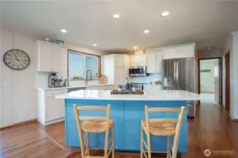 Enjoy this beautiful kitchen with a view from the sink and a new refrigerator and stove.