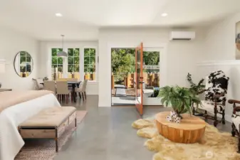 Explore the downstairs studio/flex space with polished concrete floor, wet bar and separate private entry to a patio and fenced rear yard.