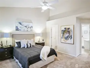 Spacious primary suite is conveniently located on the main floor