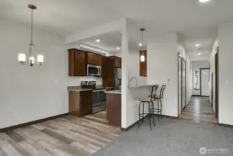 View capturing the Dining Area, Kitchen, Great Room to the Hall Entry