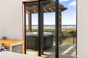 Coast Spa luxury acrylic hot tub under stylish pergola. West yard aluminum fencing