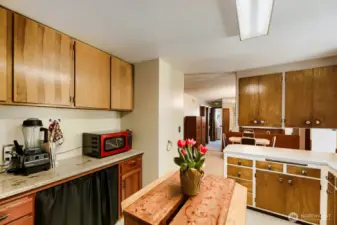 Plenty of storage in the kitchen and nice lead-out to dining area and main living areas.