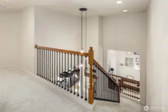 Nice staircase railings & custom lighting