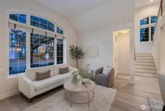 Front sitting room, adjacent to formal dining area.