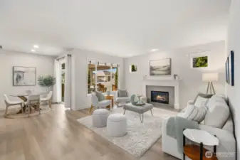 Great room, with kitchen, living room, informal dining area, and a view of the back deck.